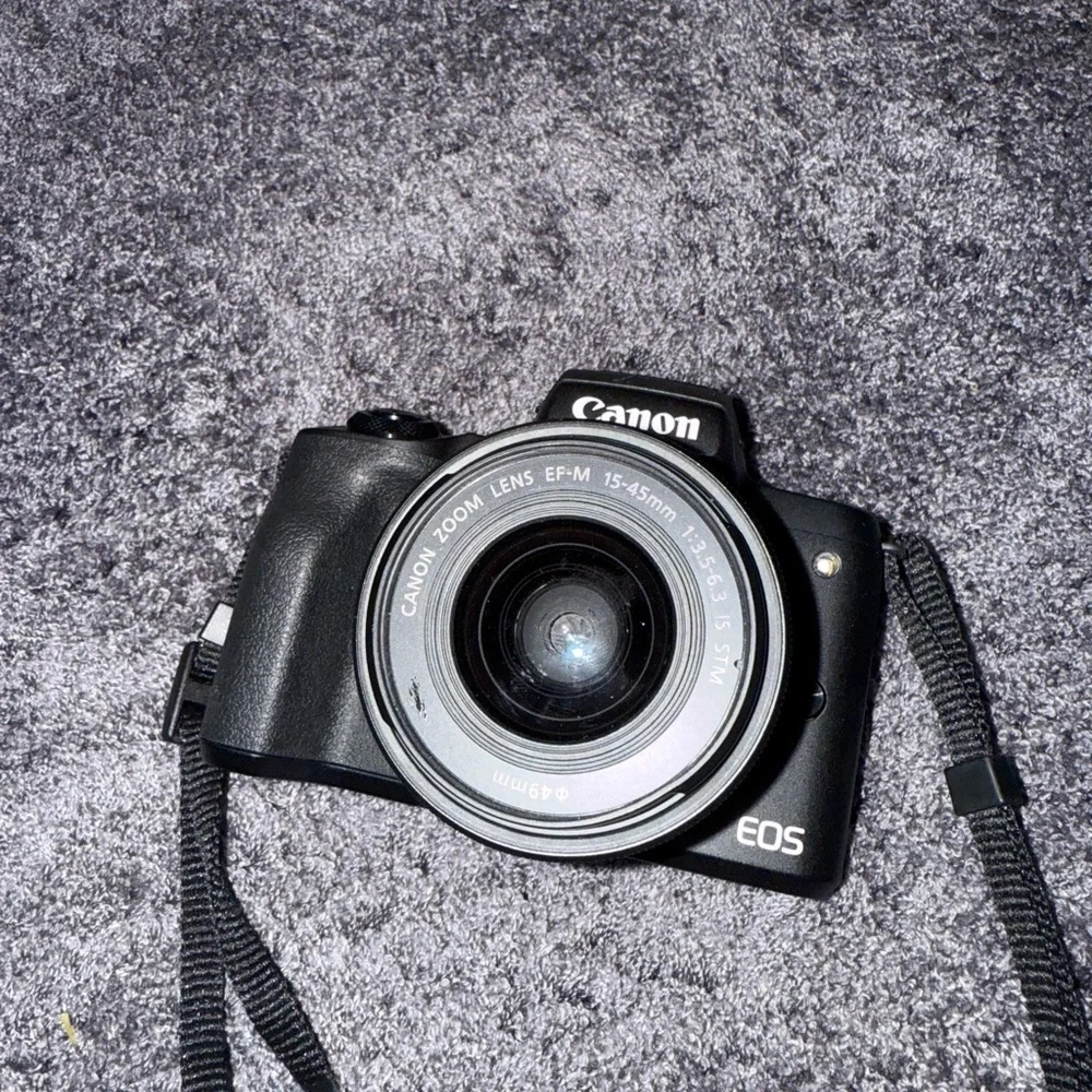 Canon Black DSLR Camera with Strap